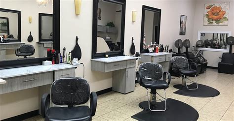 Best Hair Salons in Lansing, MI - Mirabella Salon, The Head Room Salon, The Artisan Company, Lockworx...the Aveda Salon, Capellini, Blades Hair Studio, Cost Cutters, Bliss Hair & Beauty Salon, Aspirations Salon, Bonilla's Salon & Spa